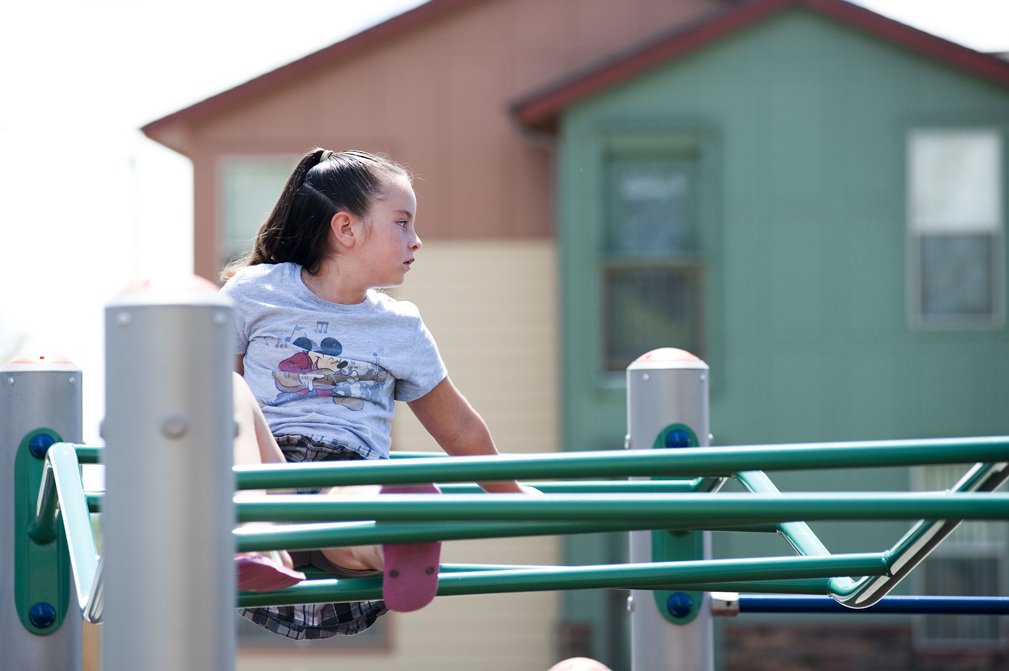 child playing on playground at villas on teh bluff delta colorado