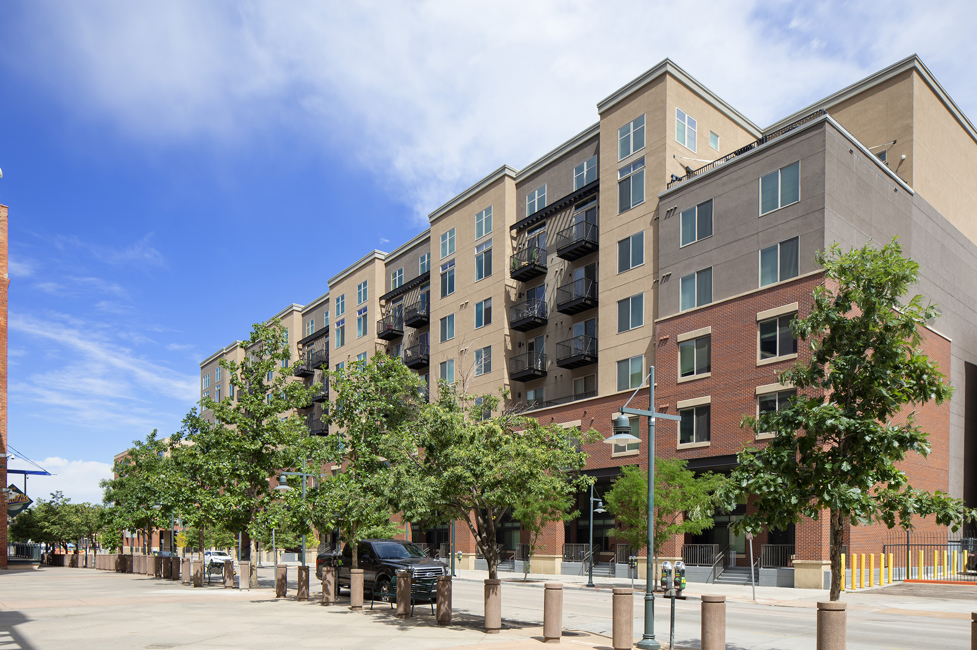 exterior view of Battery apartment building from Across Coors field entrance across the street