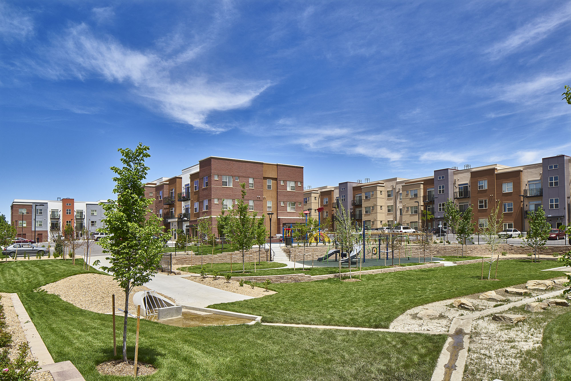 Garden, water quality and playground areas at crissman apartmetns