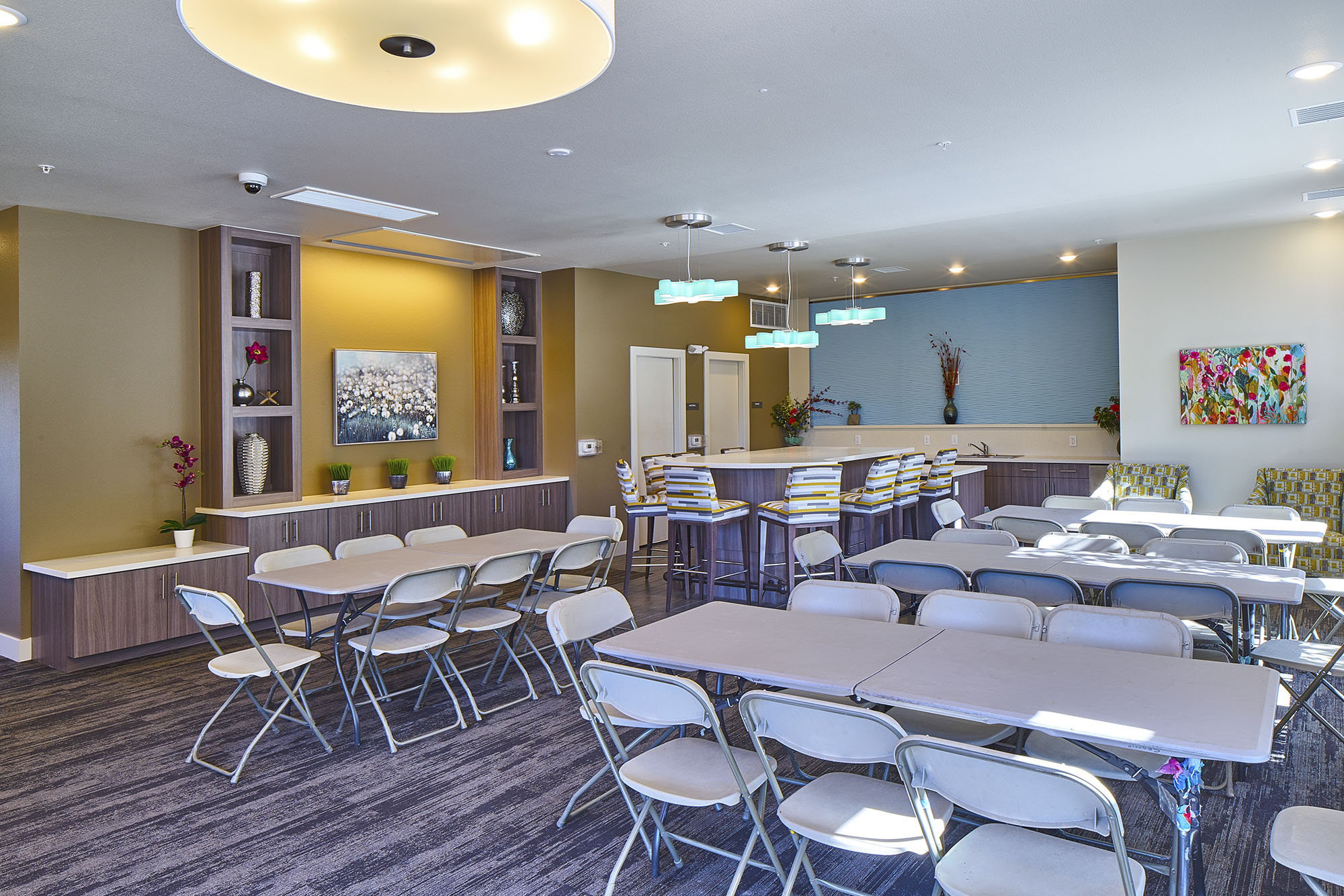 Community room interior view at Crissman apartments