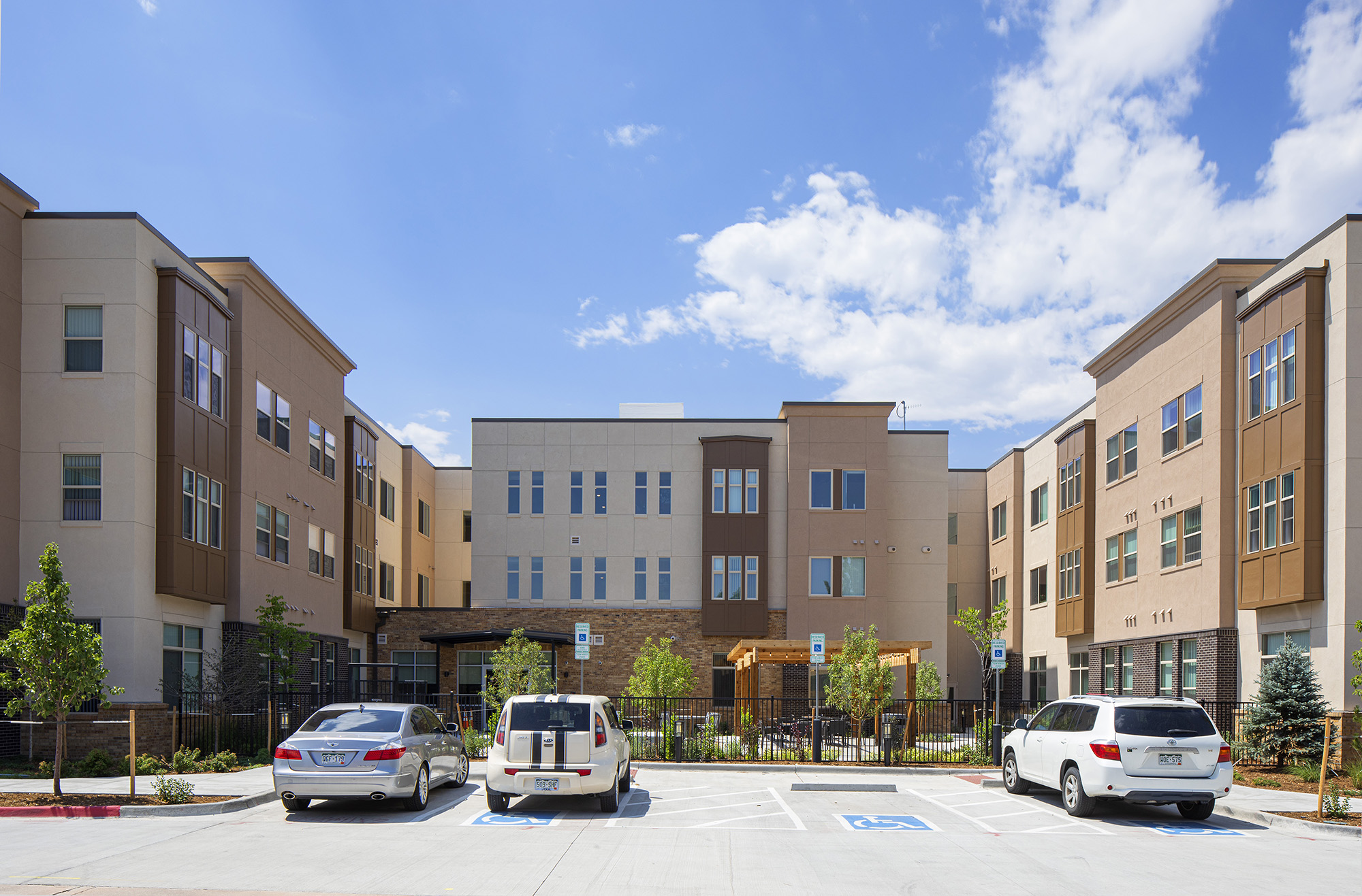 view of courtyard formed by teh U-shaped building nine mile station