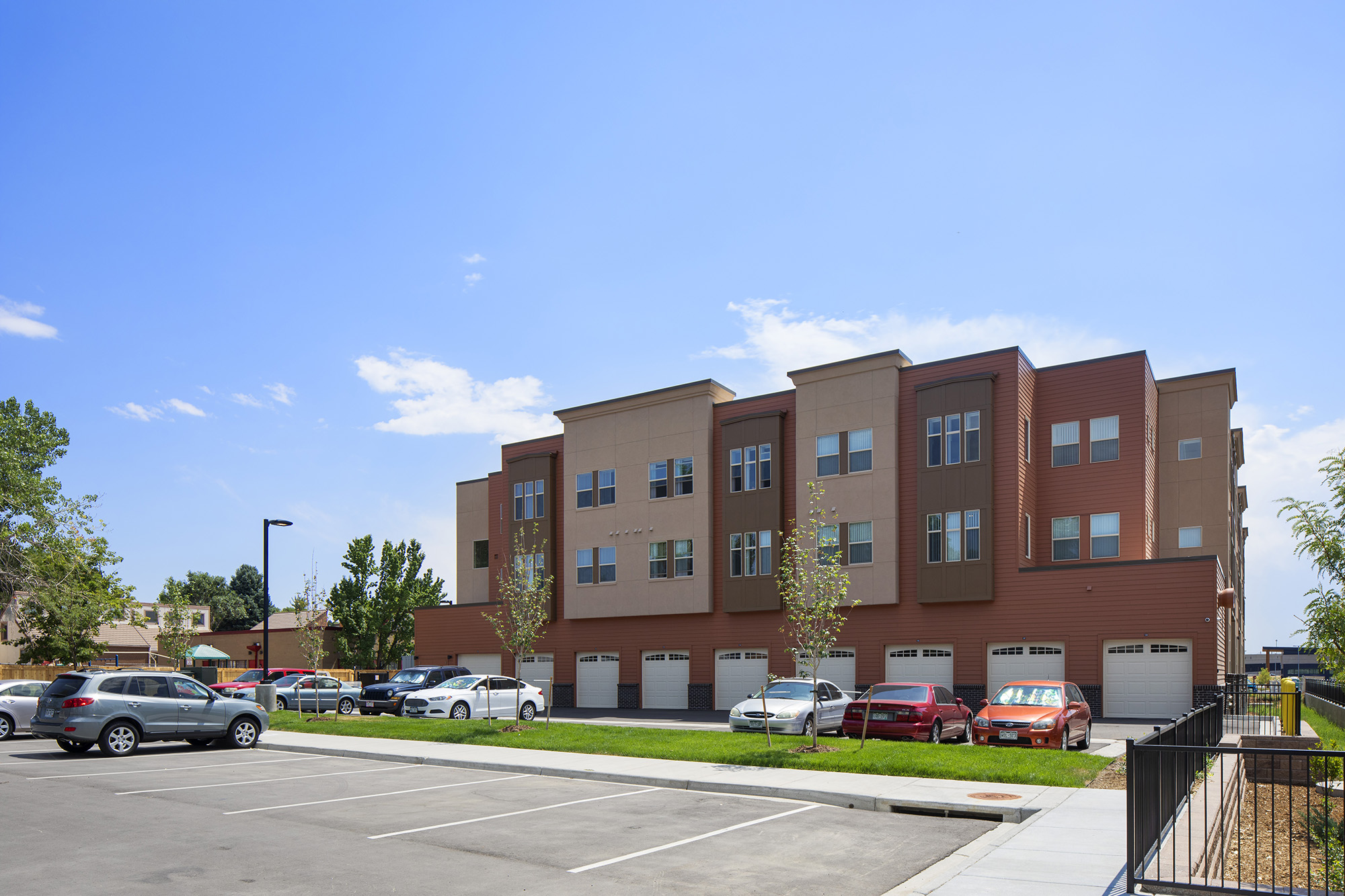 exterior view of nine mile station from parking lot showing tuck under parking