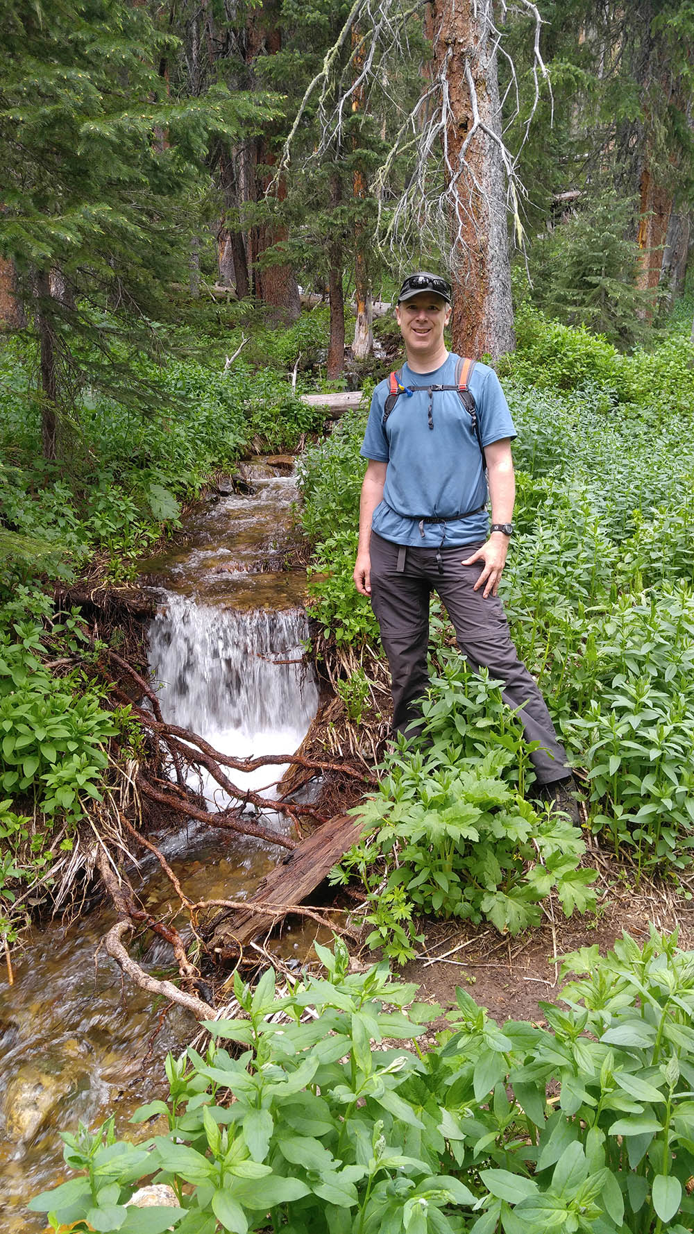 Photo of Alan on a hiking trail