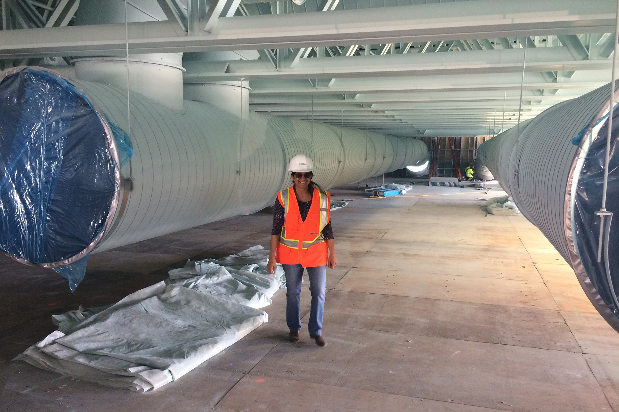 photo of jeru in a hard hat on a construction site